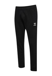 Schwarze Jogginghose aus weichem Material, mit elastischem Bund, schmal zulaufenden Beinen und einem weißen Logo auf der linken Hüfte zur Markenkennzeichnung.