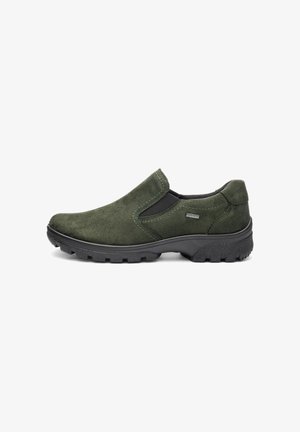 Dark green suede slip-on shoe with black elastic side panels and rugged black rubber sole, featuring a small Gore-Tex tag on the side.
