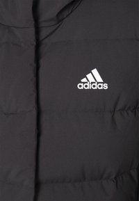 adidas Sportswear HELIONIC czarny
