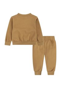 Completo per bambini composto da una felpa e dei pantaloni color sabbia. Tessuto morbido con polsini e vita a costine. Design semplice senza fantasie o accenti.