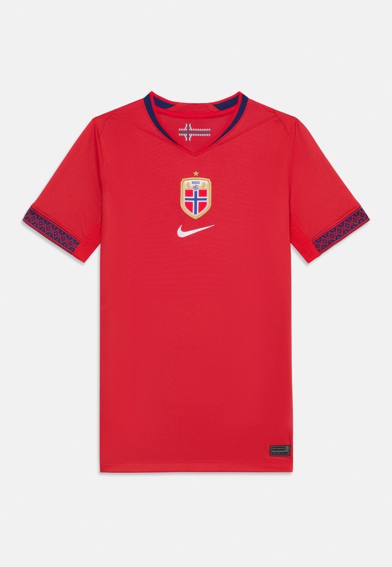 Punane spordijärk, mis on valmistatud kerge kangaga. Omab V-kaelust, siniseid ääriseid ja mustrilisi varrukaid. Sisaldab vappi koos lipu ja Nike logo.