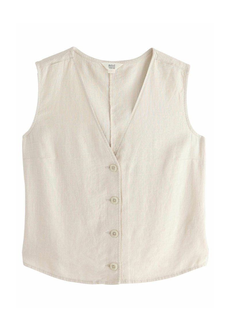 Blusa sin mangas de color crema con escote en V profundo, cierre frontal de cinco botones y textura sutil. Cuenta con bolsillos laterales invisibles.