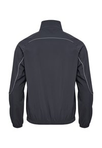 Mörkgrå lättviktig jacka med hög krage, elastisk midja och ärmslut. Har subtil reflexpipning längs axelsömmarna.