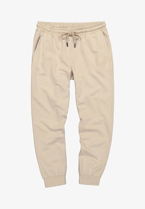 Beige joggerbukser med snor i taljen, elastisk talje og manchetter, sidelommer og et diskret rundt broderet logo på højre lår.