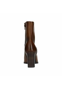 Bruine leren enkelboot met een ronde neus, hak en ritsdetail aan de achterkant. Eenvoudige textuur en slanke silhouet.