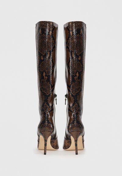 Knee-high boots in faux snake skin, featuring a glossy brown pattern, tapered heel, and back zippers for closure.