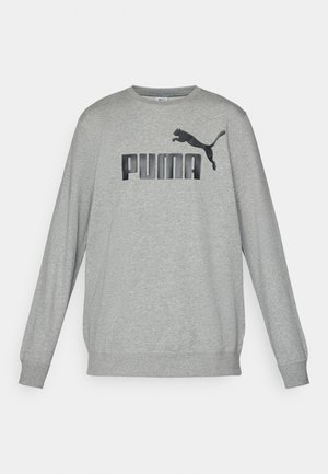 Sivý dlhý rukáv mikina vyrobená z bavlneného zmesi, s čiernym logom "PUMA" a skákajúcou grafikou pumy na prednej strane. Těsné manžety.