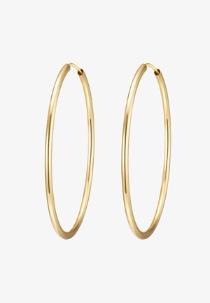 Zlaté kovové kruhové náušnice s hladkým, lesklým povrchom. Majú kruhový tvar a tenký, plochý profil.