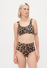 Leopard print bikini set featuring a metallic sheen, thick straps, and high-waisted bottoms for a fitted silhouette.