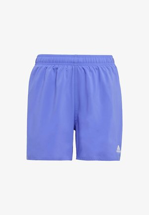 Purple athletic shorts with an elastic waistband, smooth texture, and white logo detail on the lower hem. Lightweight and breathable design.