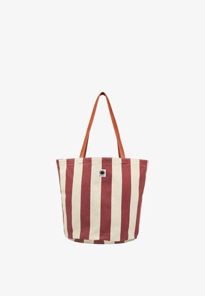 Leinentasche mit vertikalen roten und weißen Streifen und braunen Ledergriffen, mit einem kleinen schwarzen Sonnenemblem auf der Vorderseite.