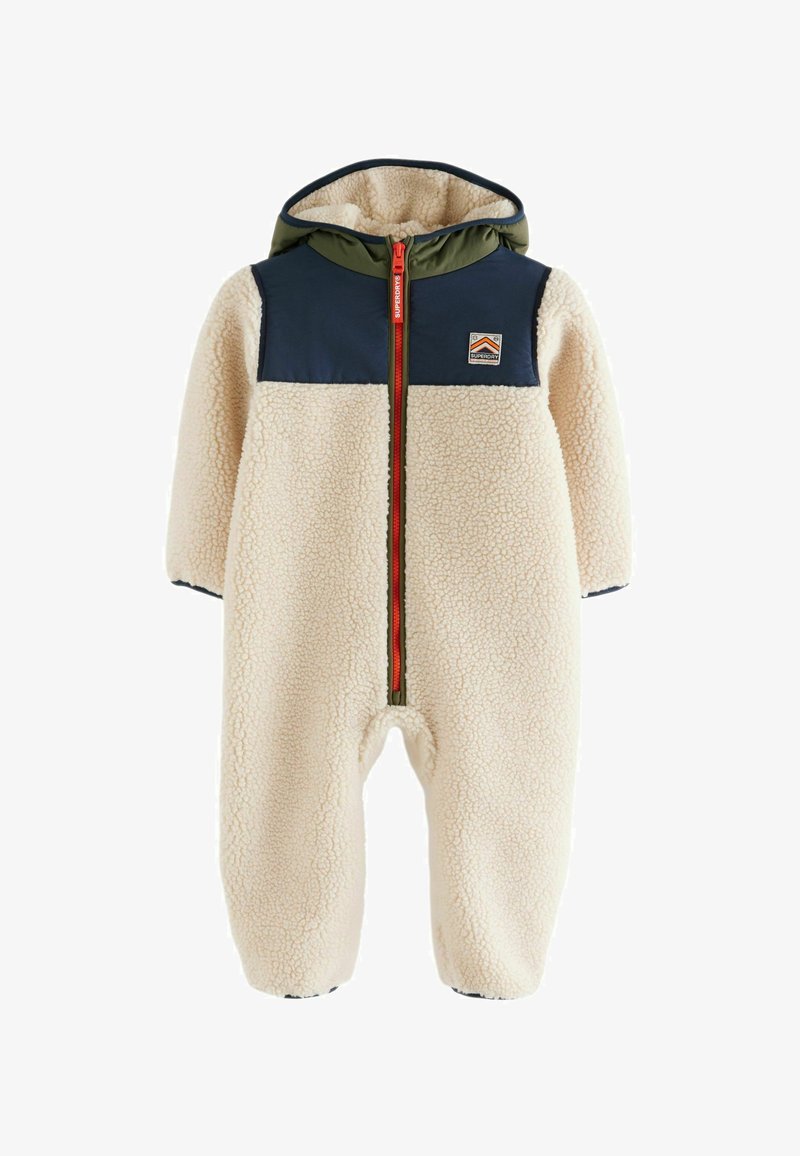Babymössa i krämfärgad fleece med en panel i marinblått och olivgrönt, med full dragkedja och elastiska ribbkanter för värme och komfort.
