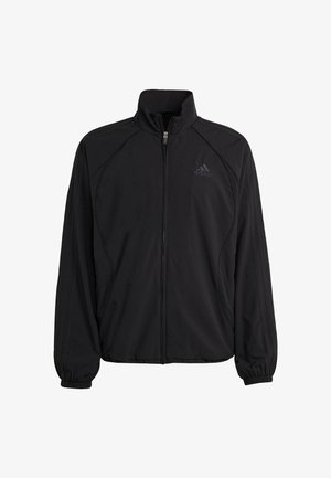 Veste de sport noire avec col haut, fermeture éclair et poignets élastiques. Présente un design ton sur ton à trois bandes sur les manches et un logo sur la poitrine.