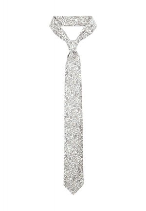 Serek jedwabny w wzory z kwiatowym motywem w delikatnych tonacjach kremu i taupe, o wąskim kształcie i spiczastym końcu.