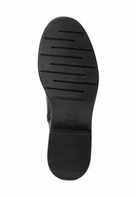 Suola di scarpa in gomma nera con scanalature orizzontali e verticali per aderenza. Presenta un'impronta del logo e un design del tallone arrotondato.