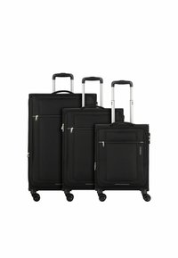 Three black suitcases in varying sizes, made of fabric with smooth texture, featuring zippered pockets and retractable metal handles.