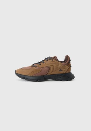 Brown athletic shoes with a mix of smooth and textured leather, black rubber sole, and dark laces. Features a logo on the side and mesh accents.