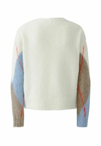 Witte gebreide trui met een ronde hals. Heeft blauwe, bruine en rode geometrische patronen op de mouwen. Zachte, gestructureerde stof.