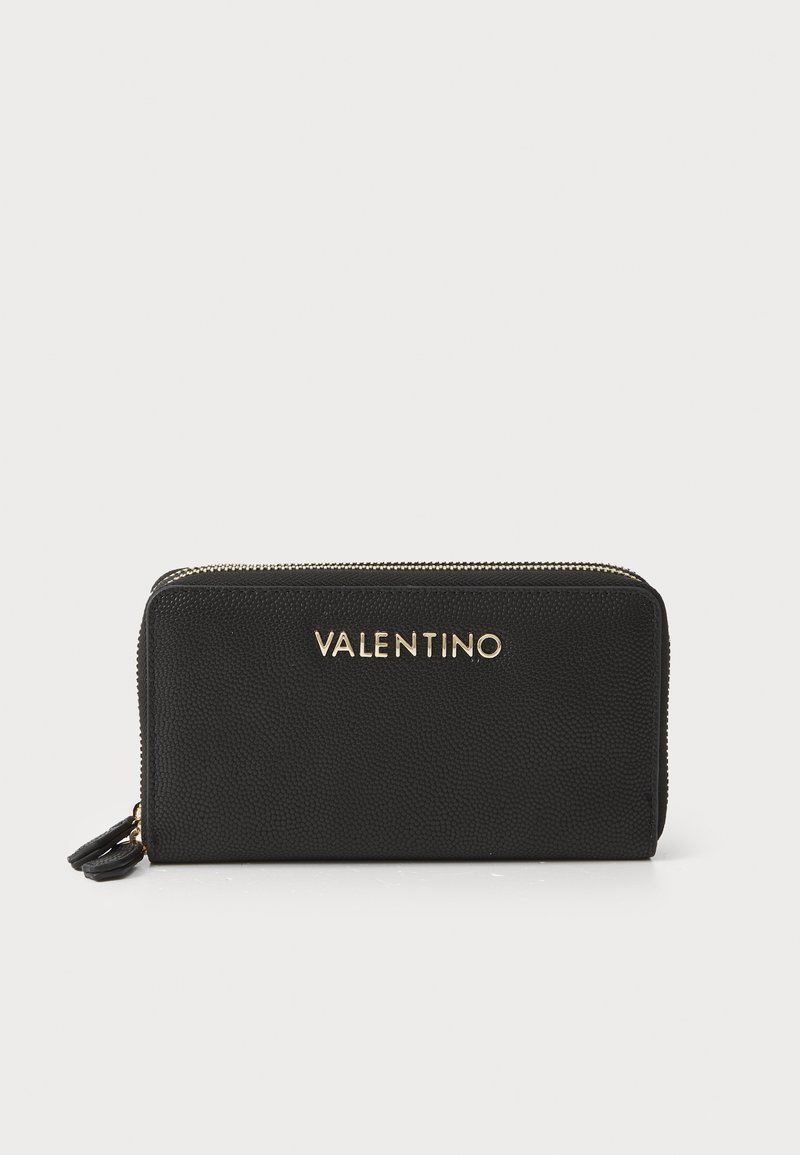 Black leather zip wallet with textured surface, gold embossed "VALENTINO" logo, and zipper hardware. Compact rectangular shape.