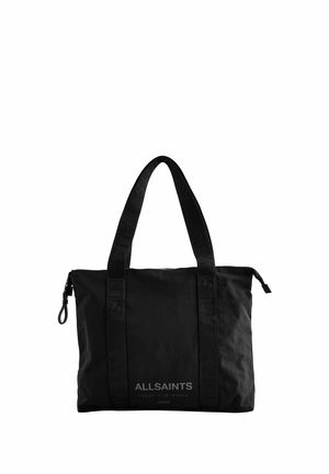 Black AllSaints tote bag with two wide shoulder straps and a zip closure on top, featuring brand name and Japanese text on front.
