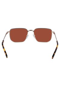 Occhiali da sole di colore marrone con forma rettangolare, montatura in metallo e punte a motivo tartaruga. Cuscinetti nasali regolabili per il comfort.