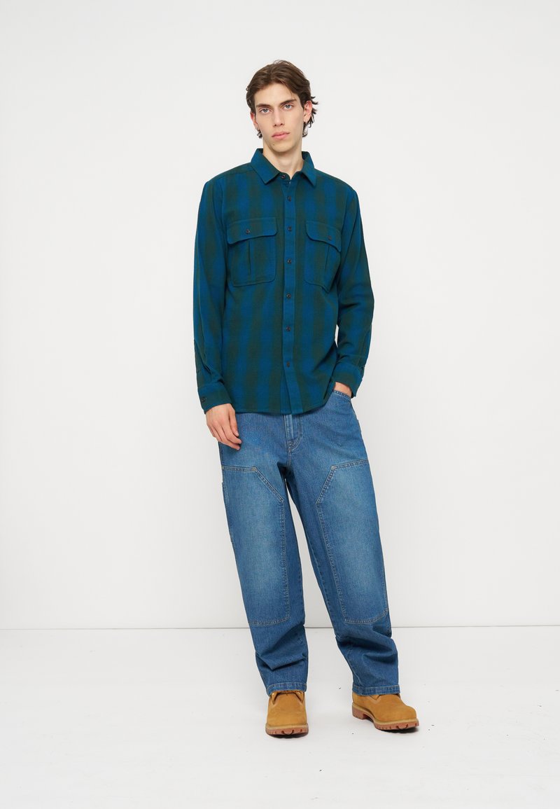 Camisa