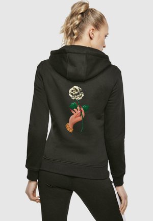 Black hoodie with a graphic of a hand holding a white rose on the back. Features a drawstring hood and ribbed cuffs and hem.