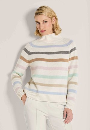 Striped turtleneck sweater in cream, featuring horizontal lines in soft pastels and browns. Ribbed neck and cuffs, knit texture.
