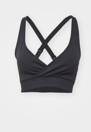 Black, sports-style bra with a cross-back design, made from soft, stretchy fabric. Features gathered front detail and wide elastic band.