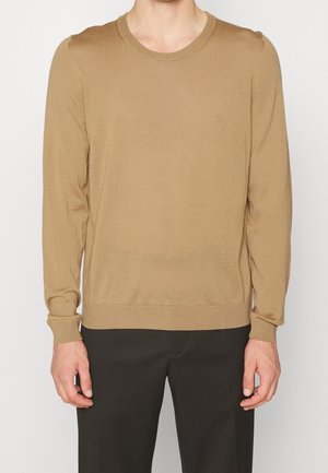 Stickad tröja - beige