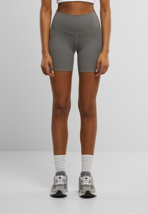 Grijze high-waisted sportshorts van rekbare stof, met een gladde textuur en zonder zichtbare patronen of hardware.