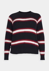Marineblå strikket sweater med tykke røde og hvide striber, ribbet halsudskæring og kant, samt et struktureret kabelmønster over hele. 