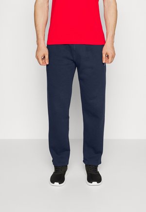 LEFT LEG LOGO - Tracksuit bottoms - vector navy