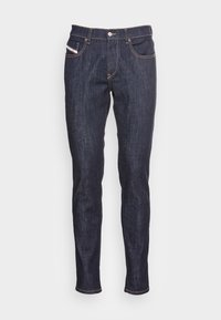 Mörkblå denimjeans med smal passform, med framknäppning, fem fickor och kontrasterande gula stygn.