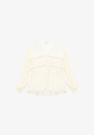 Cream-colored blouse featuring long sleeves, a V-neck, ruffled detailing at the waist, and a flowy, lightweight fabric.