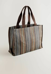 Striped tote bag made of woven fabric in brown, yellow, and black. Features sturdy brown handles and a structured shape.