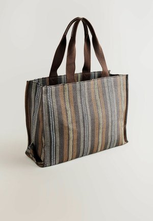 Ribaga kott, mis on valmistatud kootud kangast pruunis, kollases ja mustas värvis. Omab tugevaid pruune käepidemeid ja struktureeritud kuju.