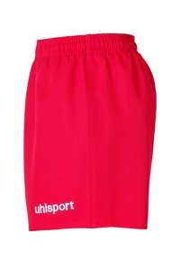 Pantalones cortos deportivos rojos hechos de material ligero, con una cinturilla elástica y un logotipo blanco de "uhlsport" en la parte inferior izquierda.