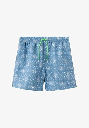 Blaue Badeshorts mit weißen Blumenmustern und einem leuchtend grünen Kordelzug am elastischen Bund.