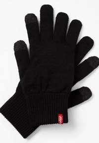Black knit gloves with a ribbed cuff. Conductive fingertips for touchscreen use. Red tab with white text on the wrist area.