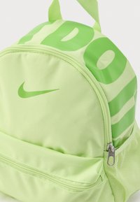 patagonia daily backpack Atom Day Pack 24L – Worn Wear® hollow Color:Green with Red Making a Leather Drawstring Side compression straps
