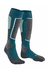 Kniestrümpfe in Teal, Grau und Hellblau mit gepolsterten Bereichen, gerippten Bündchen und winkelförmigen Mustern für Unterstützung und Komfort.