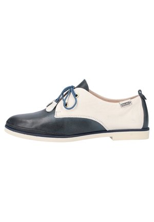 Navyblauwe en witte lederen veterschoenen met een gladde afwerking, blauwe veters en een crème rubberen zool.