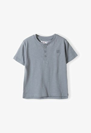 Grey short-sleeve t-shirt made of soft fabric, featuring a round neckline, three buttons, and a small logo embroidered on the chest.