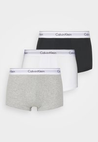 Calvin Klein boxershorts i svart, hvitt og grått. Mykt stoff med en elastisk midjebånd med logo. Hver modell har et klassisk design.