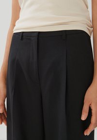 someday. CELONG - Pantalon classique - black