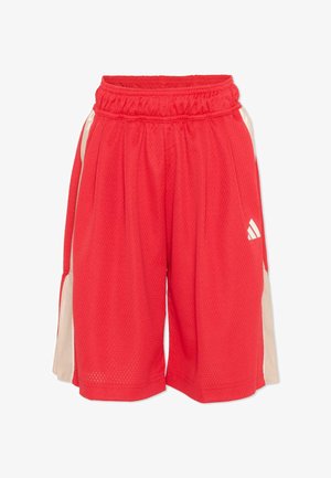 Shorts de sport en mesh rouge avec une ceinture élastique et des panneaux latéraux beige, comportant un petit logo blanc Adidas sur la jambe droite.