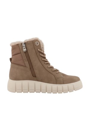Brown suede high-top sneaker boot with thick white ridged sole, side zipper, lace-up front, padded ankle, and faux fur lining visible at the collar.