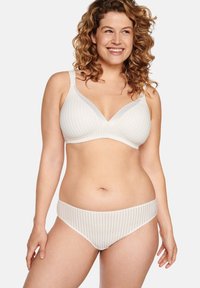 Light beige bra and matching brief set featuring vertical stripes, soft fabric, a plunging neckline, and wide adjustable straps for comfort.
