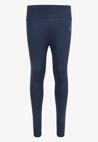 Leggings bleu marine en matériau extensible, avec une taille haute et un logo circulaire bleu sur la hanche gauche. Texture lisse.